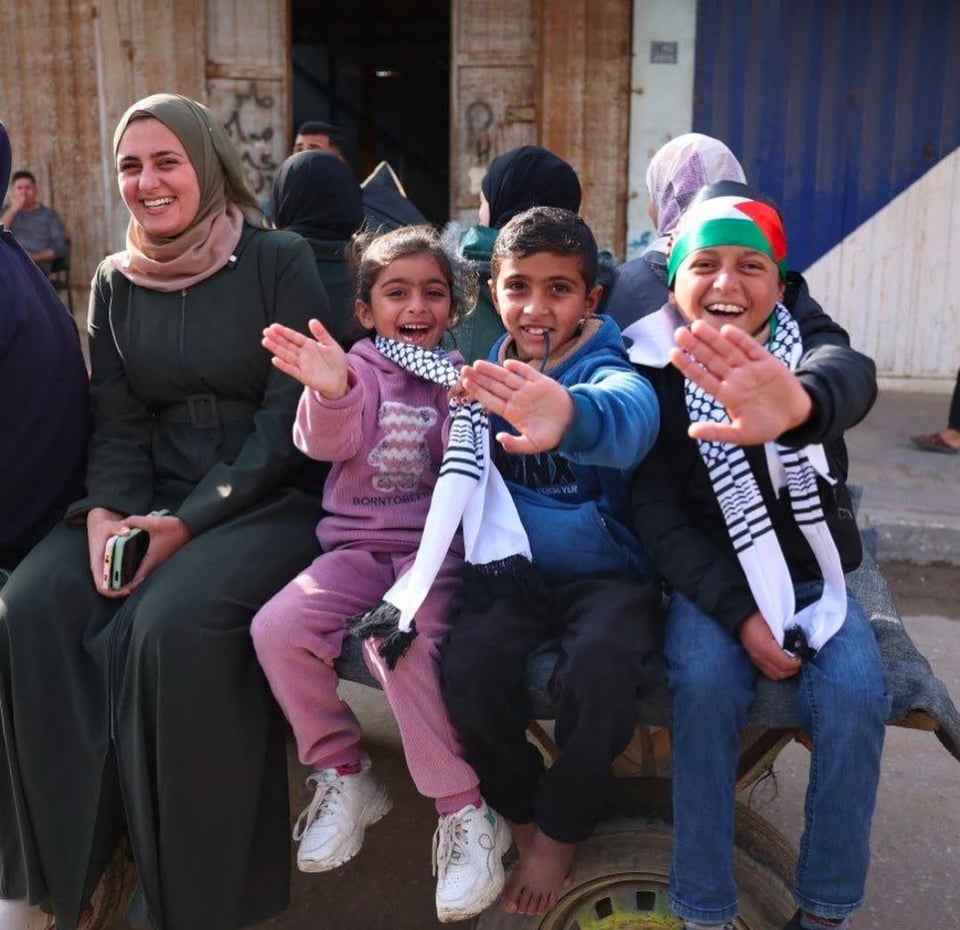 women and children smiling